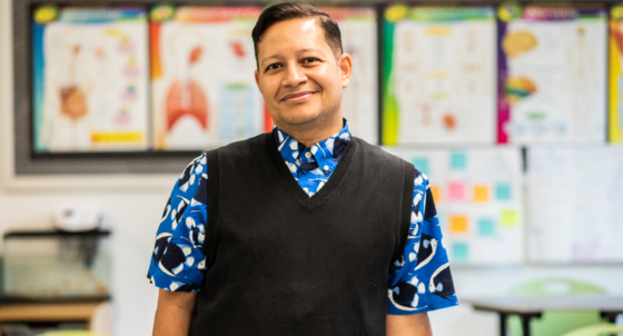 Promise Academy High School Science Teacher Jerry Perez in his classroom