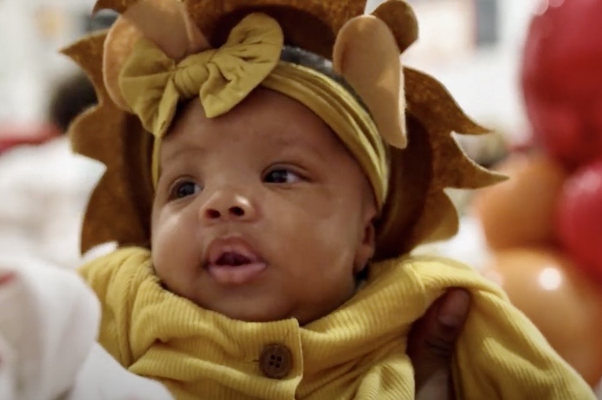 The Baby College infant dressed in lion costume at The Baby College Cycle 103 Graduation.