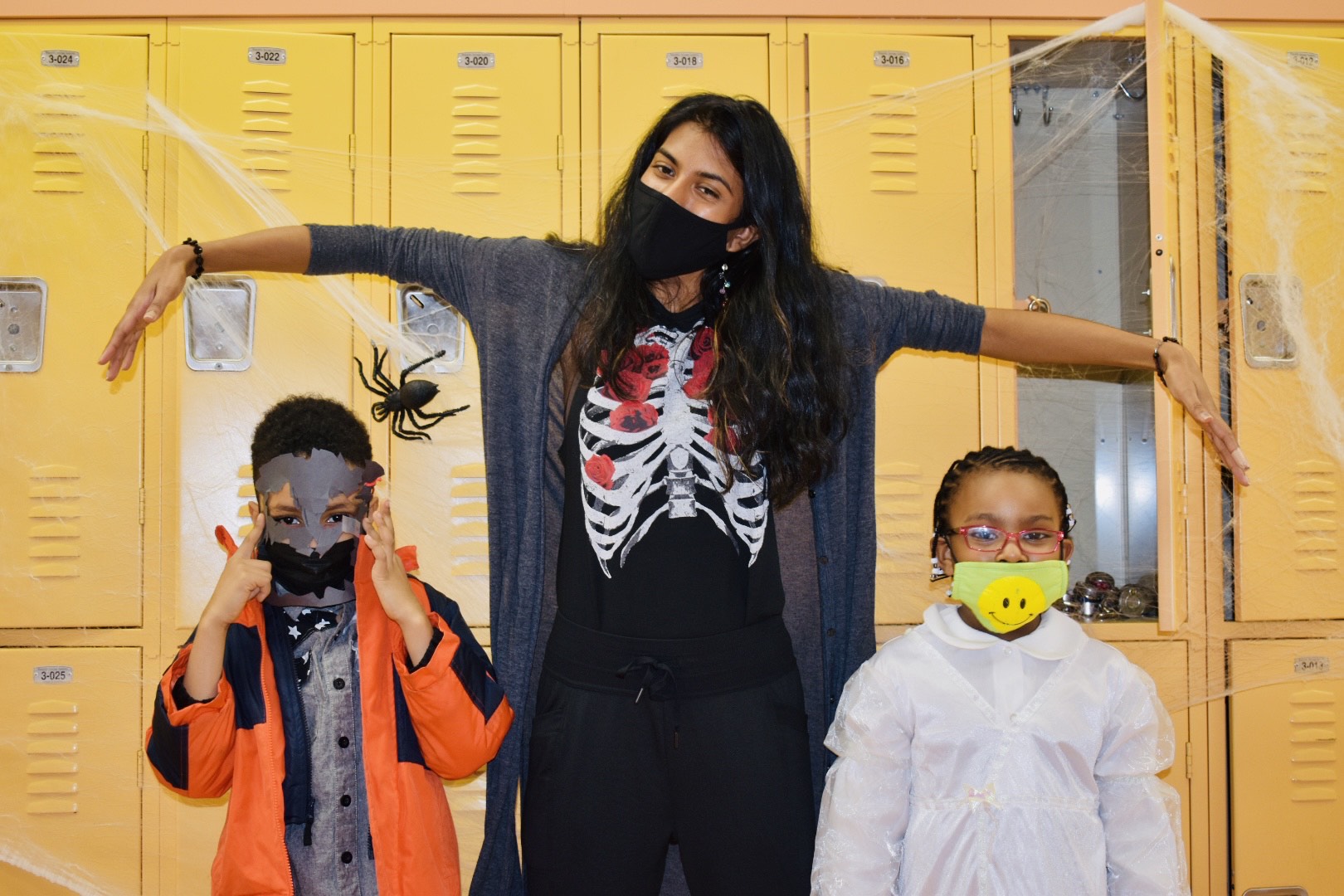 Teacher with scholars on Halloween