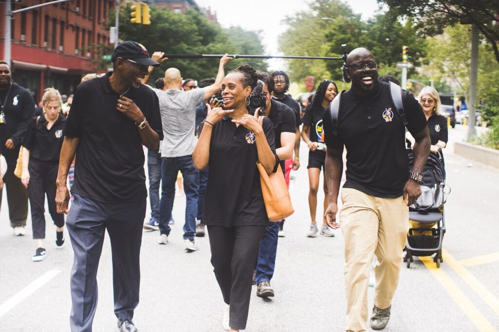 HCZ Founder and President Geoffrey Canada, former HCZ CEO Anne Williams-Isom, and current HCZ CEO Kwame Owusu-Kesse at Children's March for Peace.