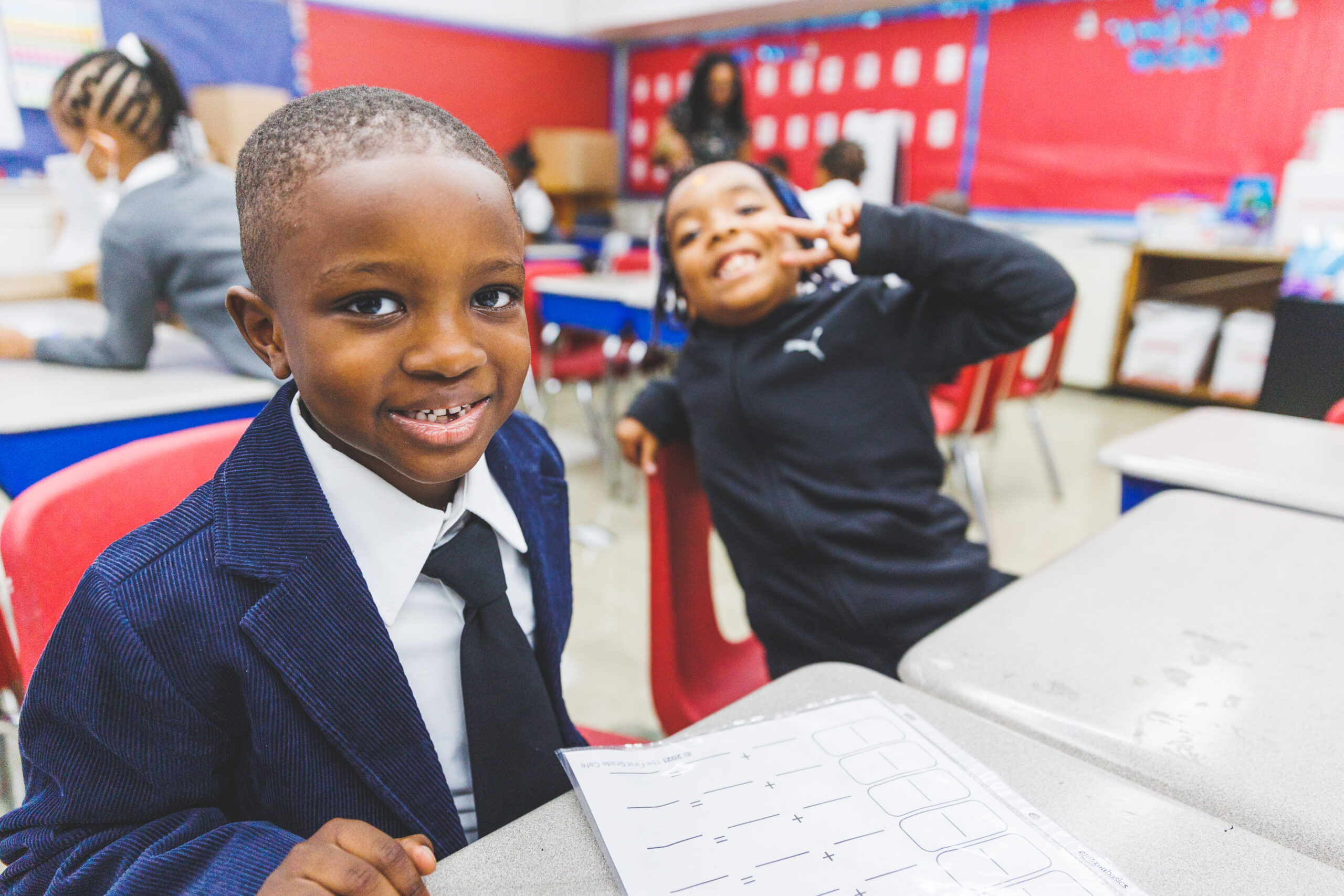 Scholars smile at the camera - Wealth Builds College Savings Accounts