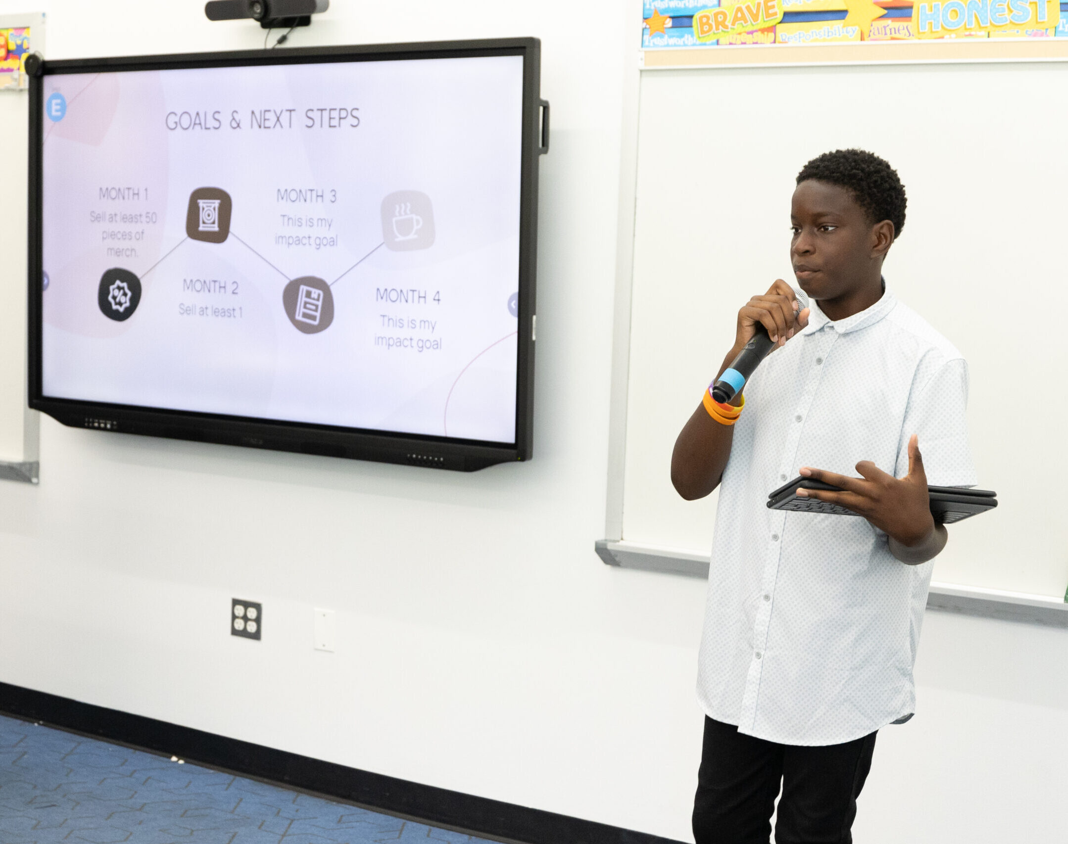 Scholar gives a presentation, Wealth Builds College Savings Accounts