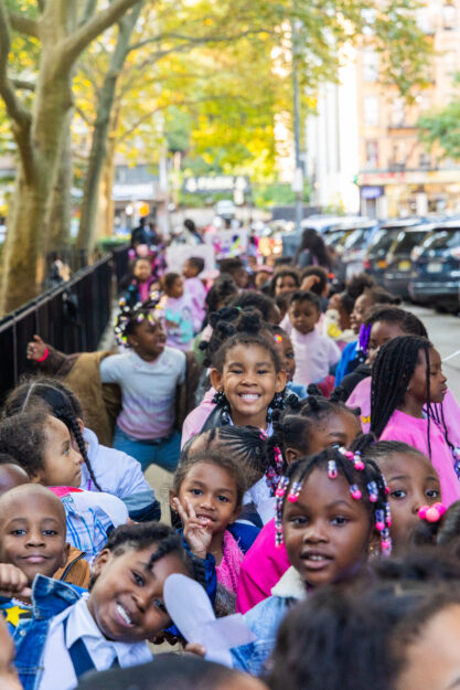 Kids outside smiling