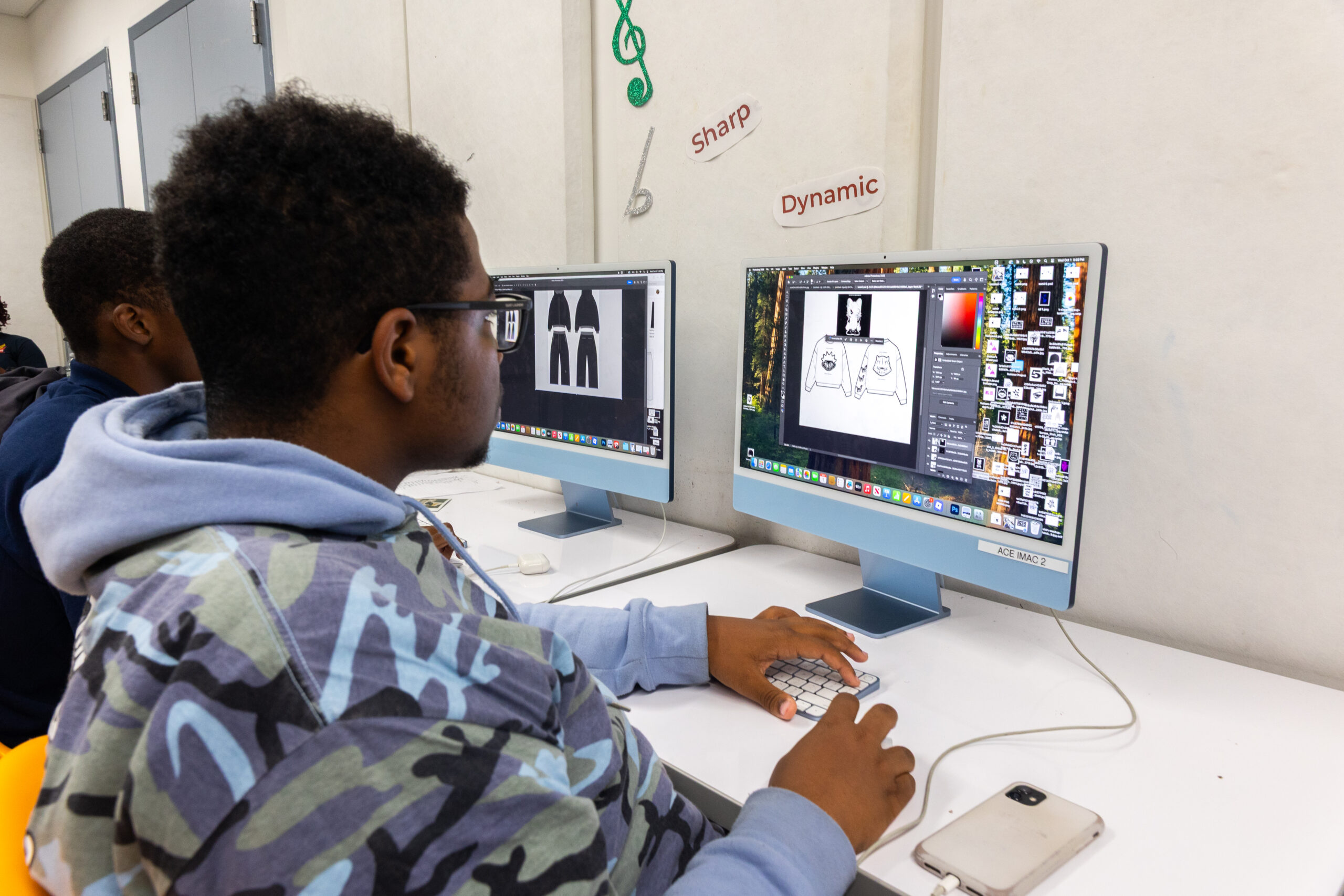 Male scholar using a computer.