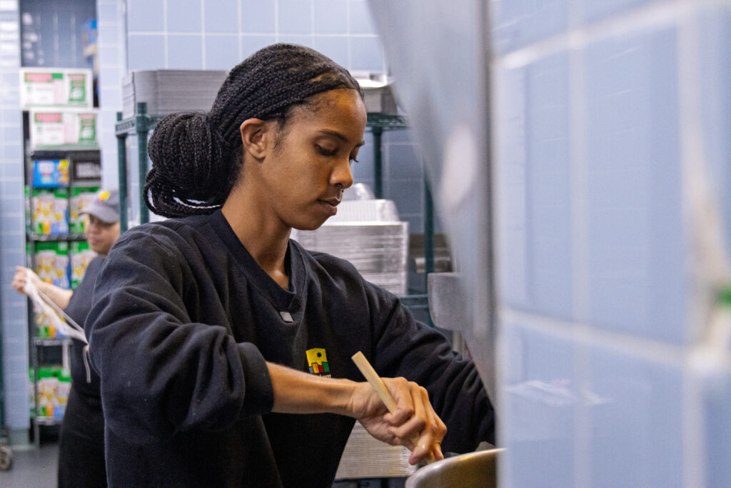 Female chef cooking the kitchen