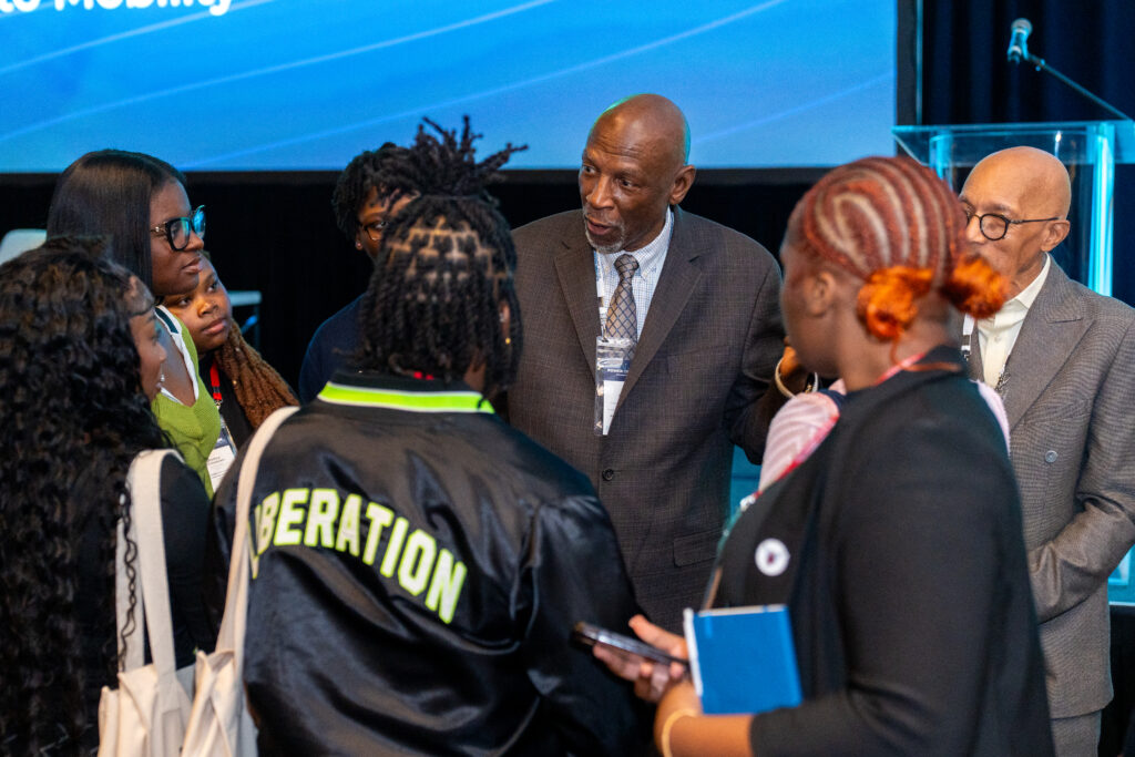 Geoffrey Canada speaking to a group of scholars